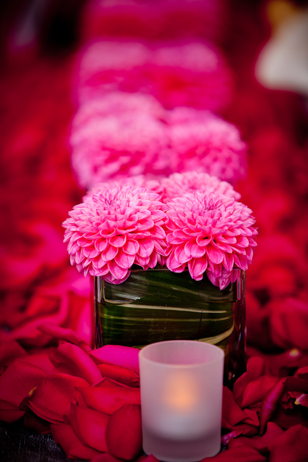 hot pink floral centerpieces - photo by New Mexico based wedding photographers Twin Lens Images